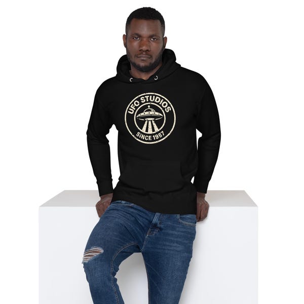 Black UFO Studios premium hoodie with distressed circular seal